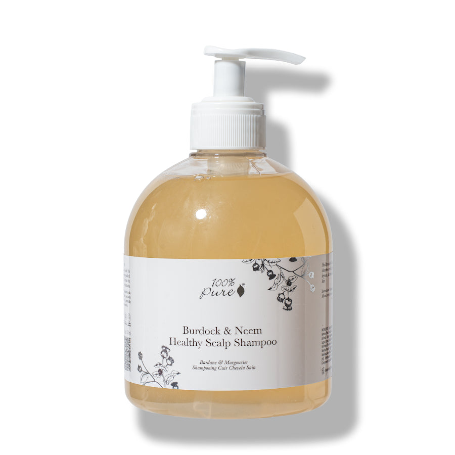Burdock & Neem healthy scalp shampoo bottle with pump on a white background