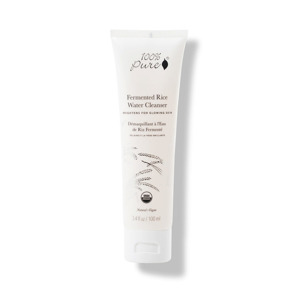 100% PURE Fermented Rice Water Cleanser – natural brightening face wash with sake, white mulberry, licorice, and mushroom extracts for soft, glowing skin.