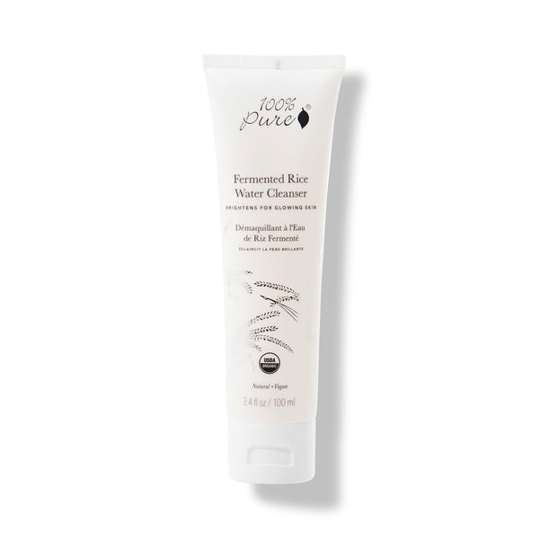 100% PURE Fermented Rice Water Cleanser – natural brightening face wash with sake, white mulberry, licorice, and mushroom extracts for soft, glowing skin.