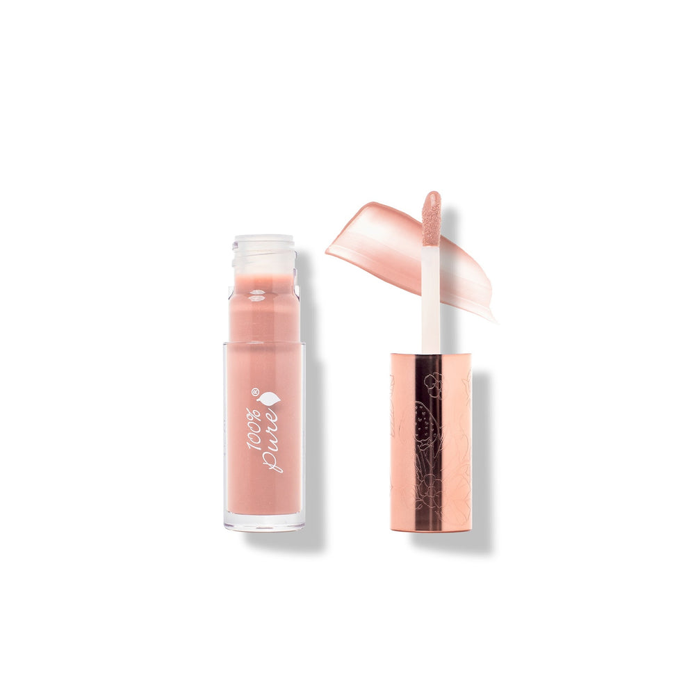 Lip gloss with rose gold cap on a white background