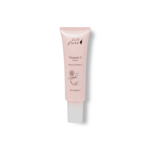 Pink skincare serum tube labeled '100% Pure Vitamin C Serum' on a white background