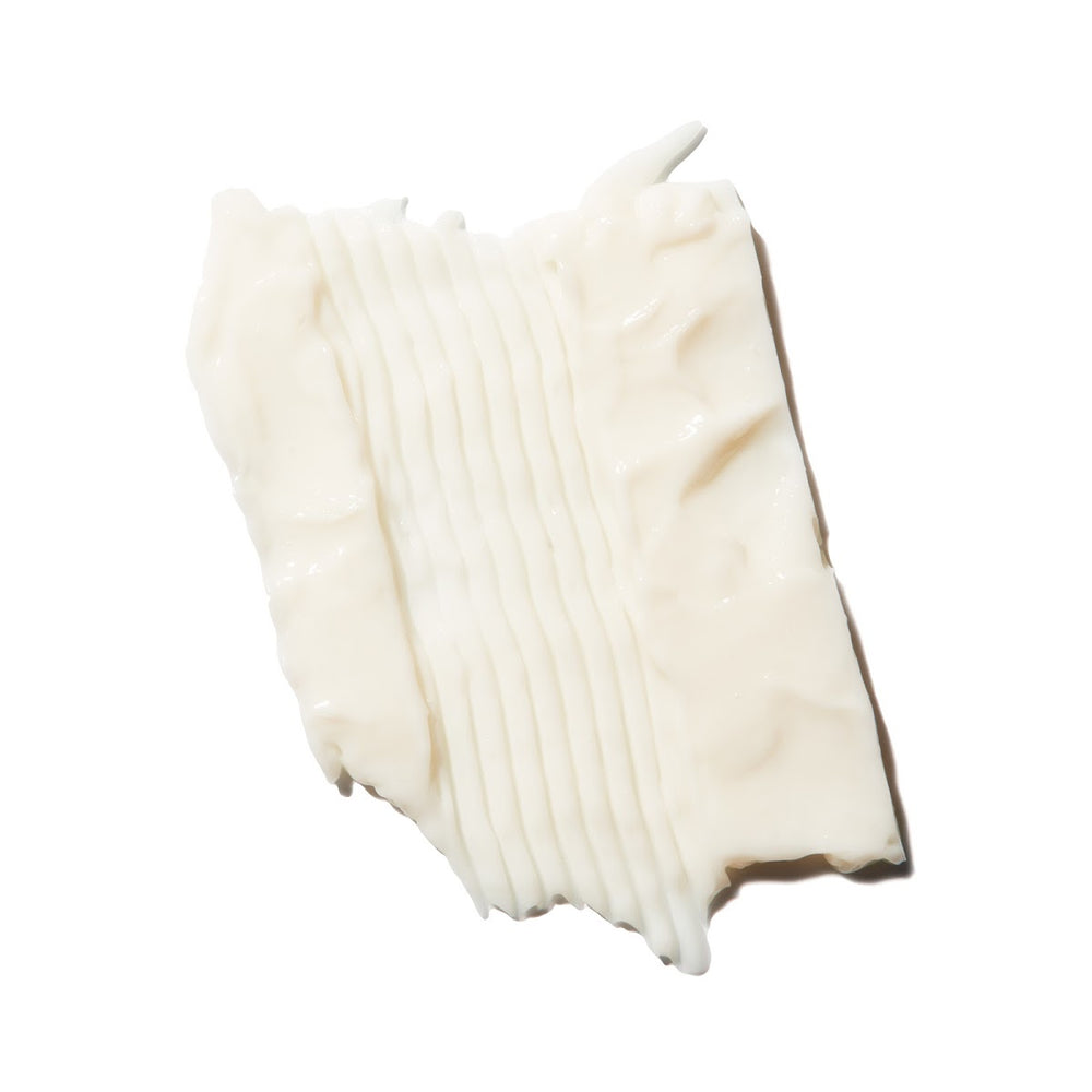 Bottle of Yuzu & Pomelo High Shine Conditioner with a pump on a white background