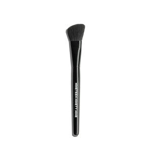 19/99 BEAUTY Soft Focus Blending Brush with synthetic bristles and wood handle for blending cream highlight and contour.
