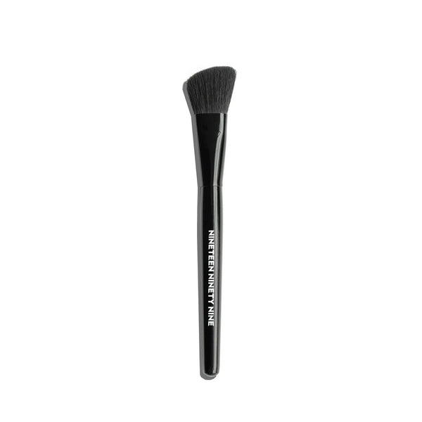 19/99 BEAUTY Soft Focus Blending Brush with synthetic bristles and wood handle for blending cream highlight and contour.