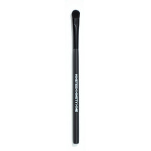 19/99 BEAUTY Tapered Multi-Brush – Versatile blending brush with synthetic bristles and a wooden handle, perfect for precision and blending on lips, eyes, and cheeks. Cruelty-free.