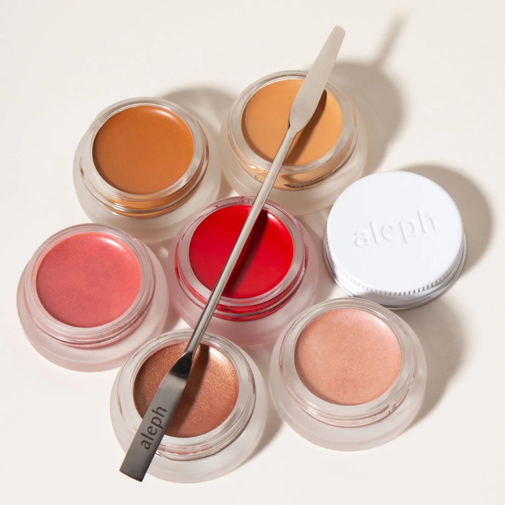 ALEPH Mixing Tool - stainless steel spatula for hygienic makeup mixing.