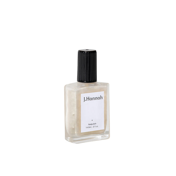 J. HANNAH Akoya Nail Polish in a light beige color.