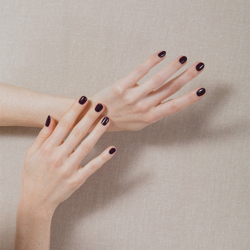 J. HANNAH Carob Nail Polish in dark brown color on white background