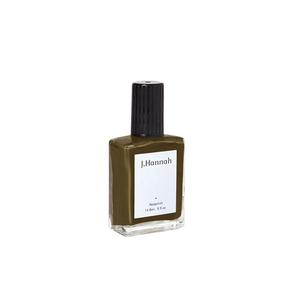 J. HANNAH Compost Nail Polish is a dark browny green color on white background