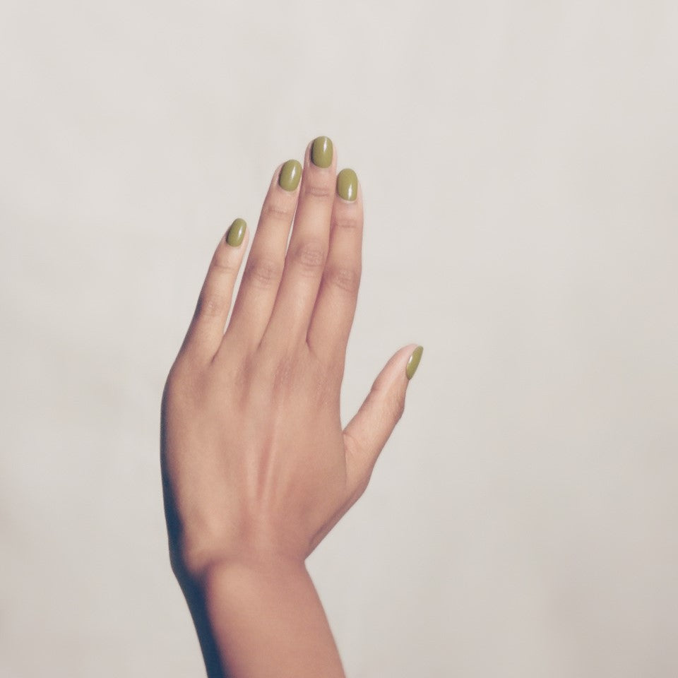 J. HANNAH Eames Nail Polish is a mossy green color on white background
