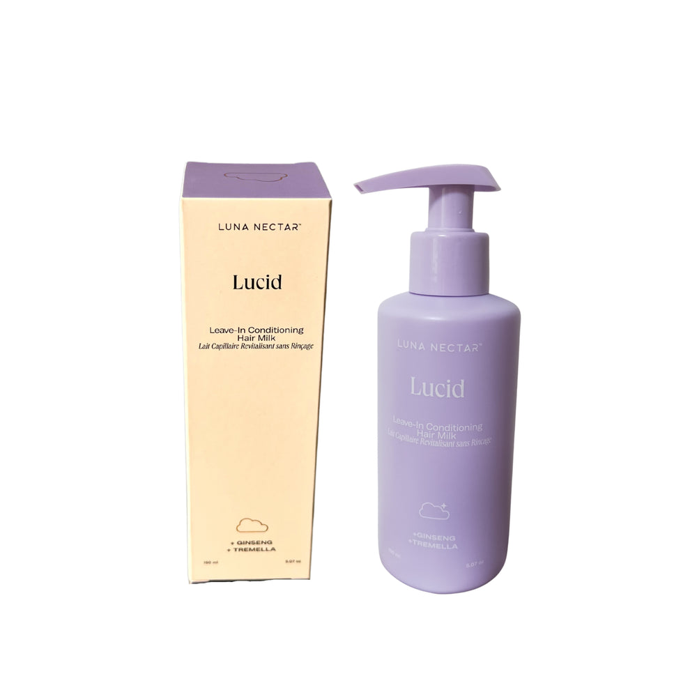 Purple bottle of Lucid Luna Nectar hair product on a white background