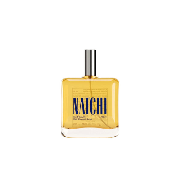 NATCHI Hair & Body Oil in a sleek bottle with spray top, designed to hydrate and nourish skin and hair naturally.
