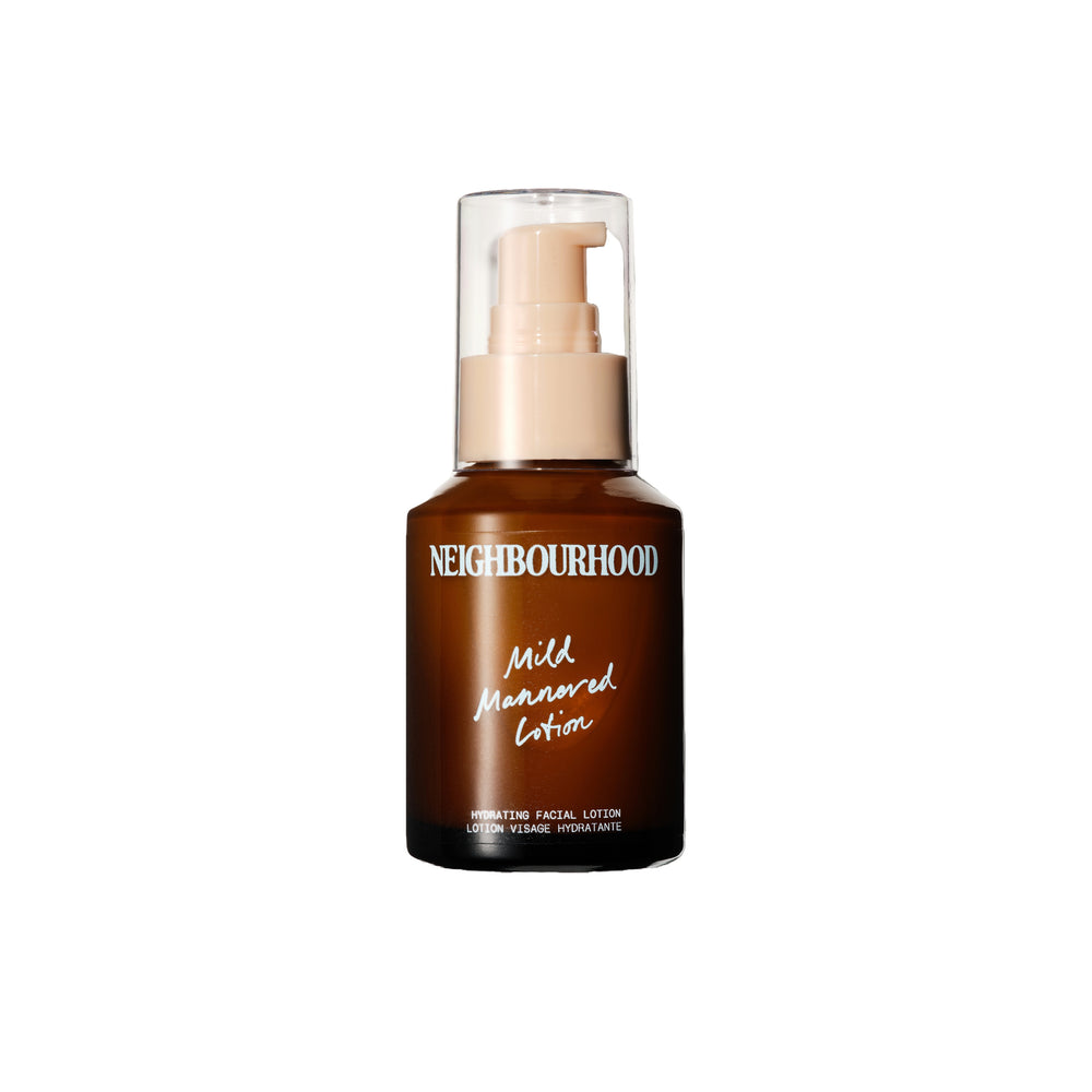 Neighbourhood Botanicals Mild Mannered Hydrating Facial Lotion in an amber glass bottle with pump. A lightweight, nourishing moisturizer for soft, comfortable skin.
