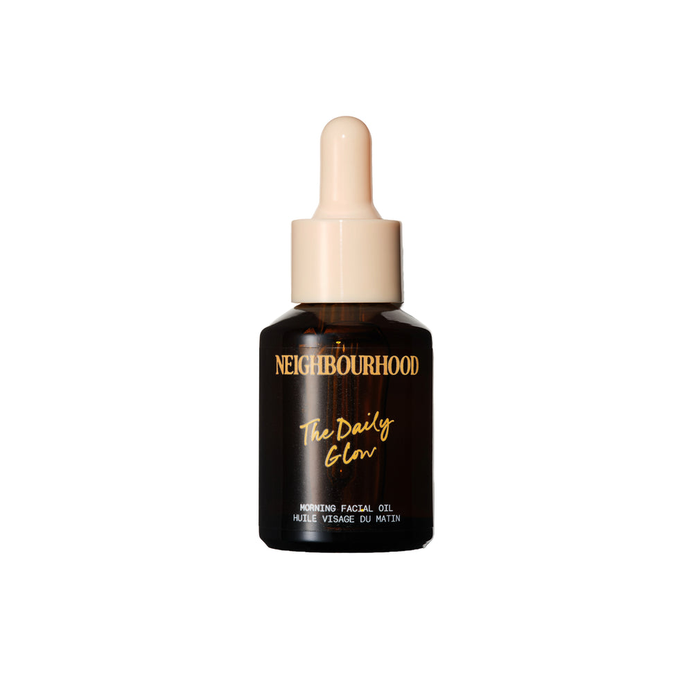 Neighbourhood Botanicals The Daily Glow Morning Facial Oil in a 30ml amber glass bottle with pipette, formulated with cold-pressed botanical oils for a fresh, radiant complexion.