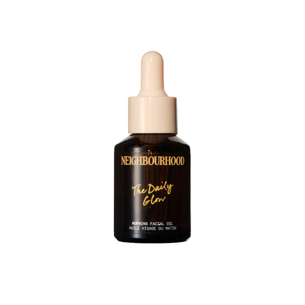 Neighbourhood Botanicals The Daily Glow Morning Facial Oil in a 30ml amber glass bottle with pipette, formulated with cold-pressed botanical oils for a fresh, radiant complexion.