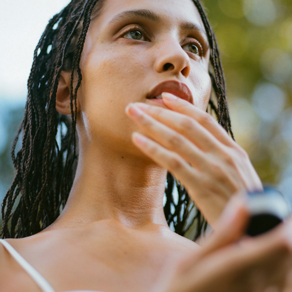 SURYA Pitta Cooling Lip Balm - a natural, floral lip balm with jasmine, rose petals, and Royal Hawaiian sandalwood. Soothes and hydrates lips.