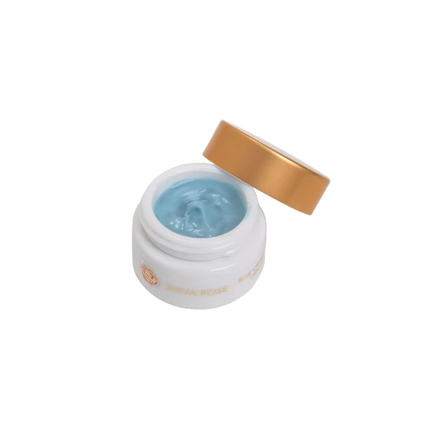 Blue Crystal Eye Cream by SHIVA ROSE, featuring a hydrating blend of camellia seed oil, squalane, and caffeine to help reduce the look of puffiness and dark circles.