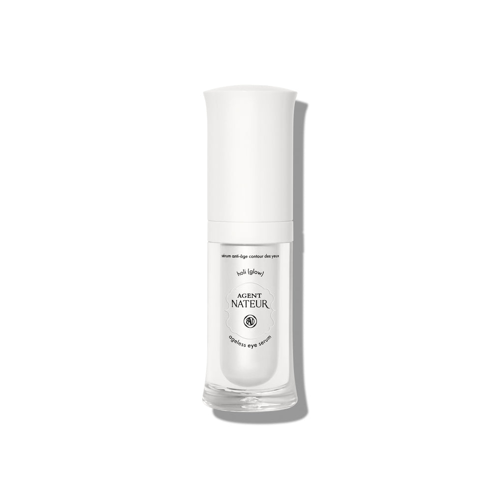 AGENT NATEUR holi (glow) Ageless Eye and Lip Serum in a sleek bottle, designed to hydrate, brighten, and smooth under-eye and lip contours with a luminous finish.