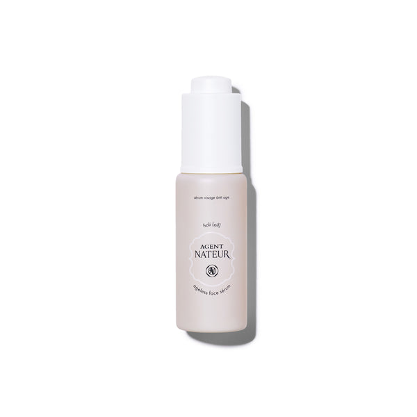 Skincare bottle labeled 'Agent Nateur' on a white background