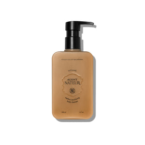 Agent Nateur holi (wash) Ageless Resurfacing Body Cleanser in sleek bottle, a foaming oil body wash with lactic acid, peony extract, and nourishing oils for radiant skin.