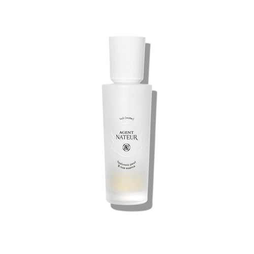 Agent Nateur holi (water) Pearl and Rose Hyaluronic Essence in sleek bottle, a hydrating essence serum with pearl powder, rose water, and hyaluronic acid for plump, radiant skin. full size