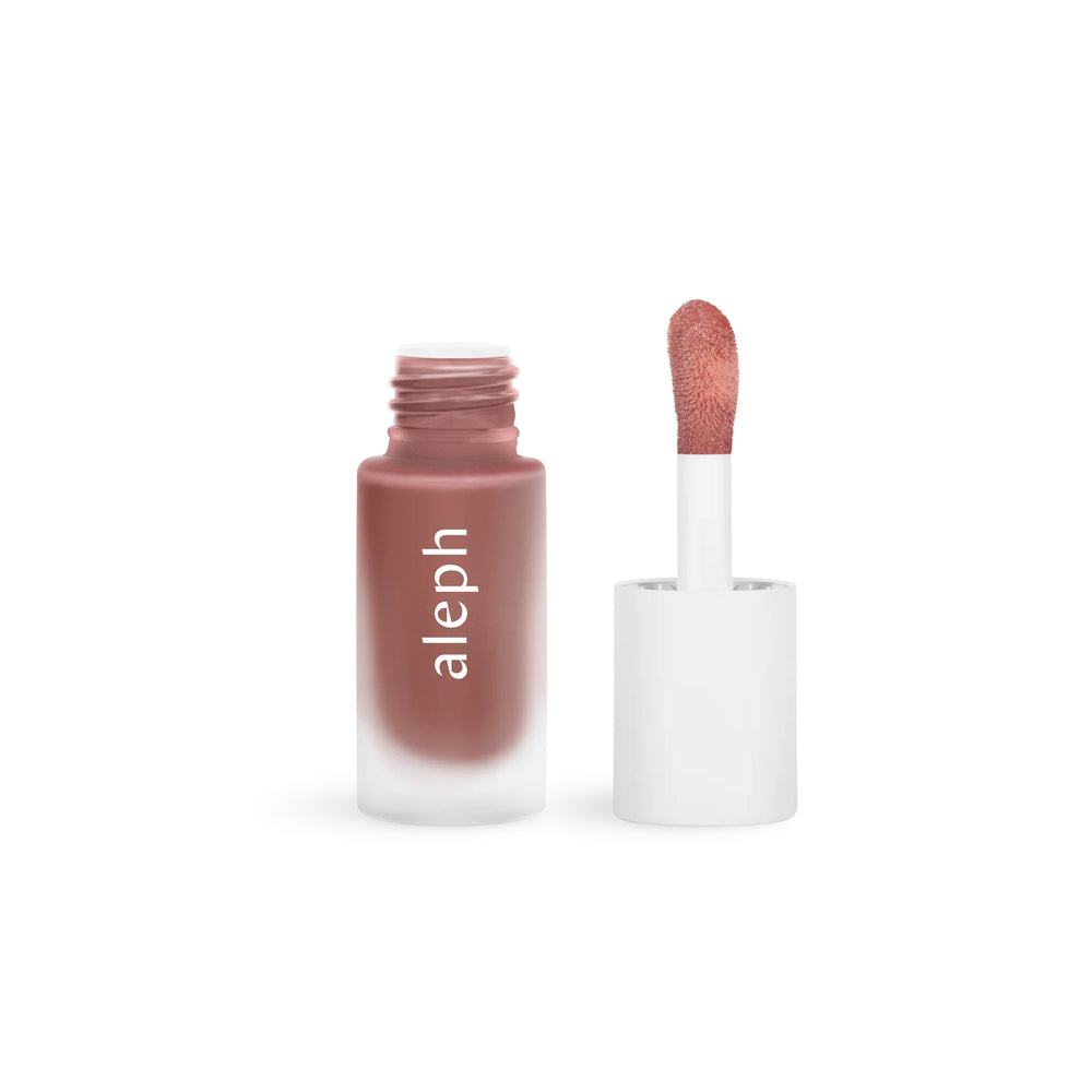 Lip gloss with 'aleph' branding on a white background
