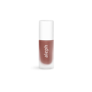 Lip gloss with 'aleph' branding on a white background