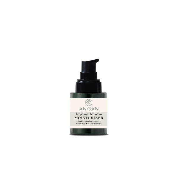 A dark green glass bottle of ANGAN Lupine Bloom Moisturizer with black pump on white background