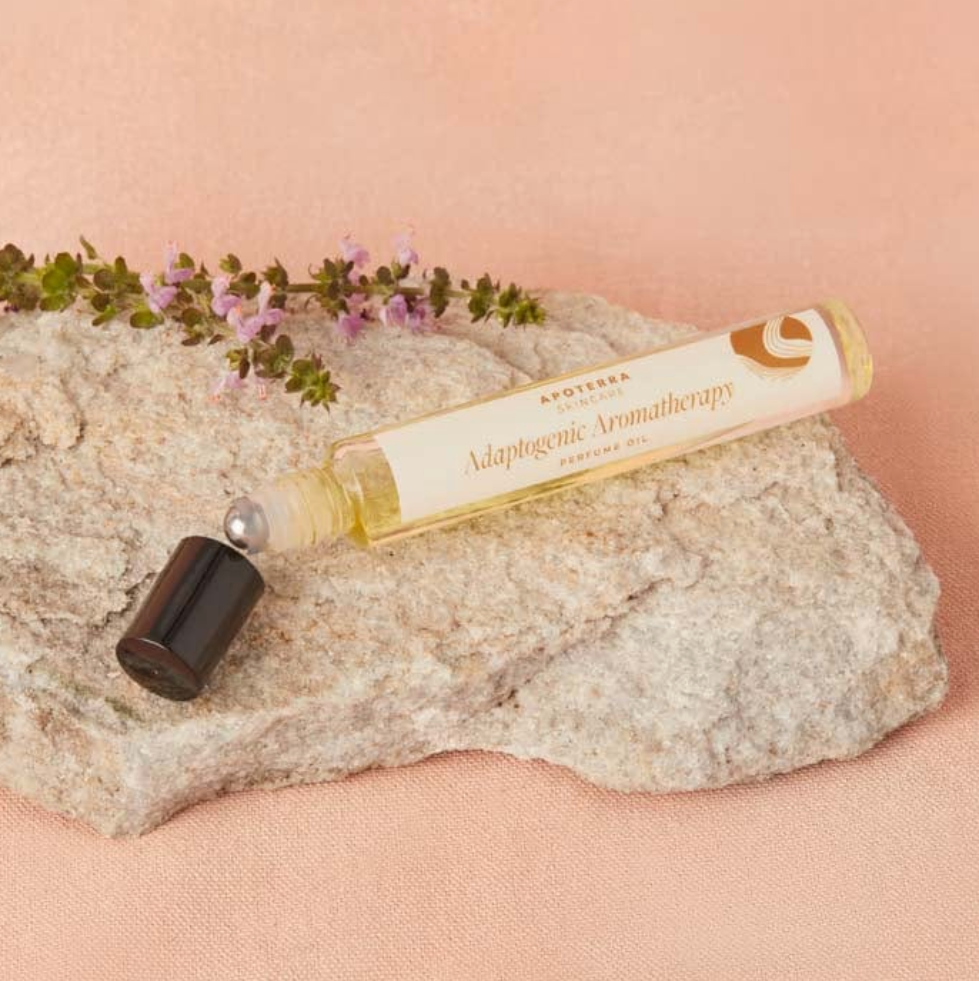 Apoterra Tulsi & Lavender Aromatherapy Oil roll-on bottle featuring a natural blend of tulsi, lavender, sweet orange, and patchouli essential oils.
