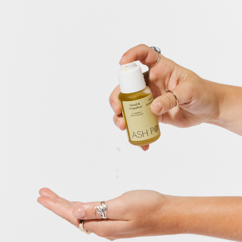 ASH POSY Neroli & Grapefruit Cleanser/Moisturizer – natural facial oil in a 50ml glass bottle, made with uplifting citrus and floral botanicals.