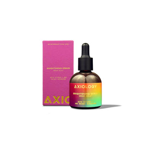 Axiology brightening serum bottle with pink box on a white background