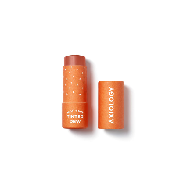 AXIOLOGY Tinted Dew Multi-Stick in Radiance, sheer coral shade with warm glow for lips, cheeks, and eyes, vegan plastic-free makeup