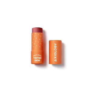 AXIOLOGY Tinted Dew Multi-Stick in The Goodness, sheer pale rose shade with soft shimmer for lips, cheeks, and eyes, vegan plastic-free makeup