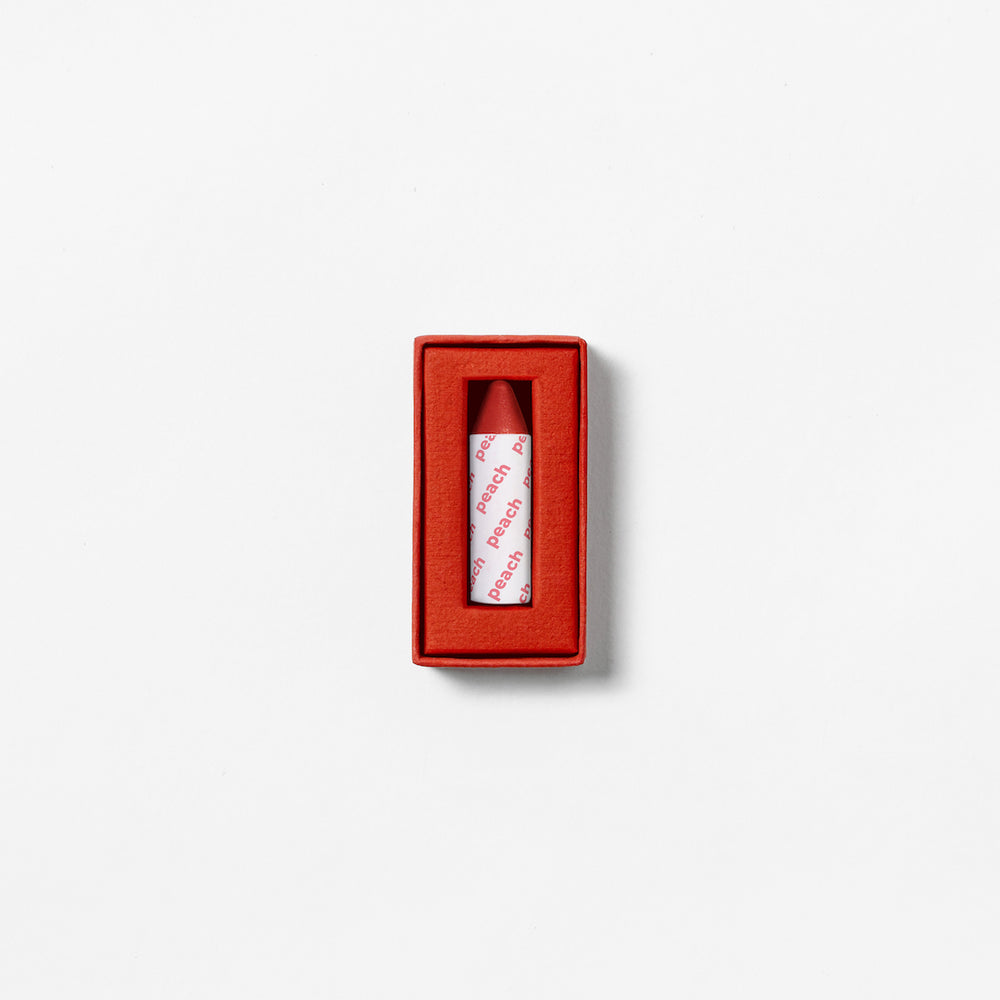 AXIOLOGY Vegan Multi-Use Balmie Crayon Peach, plastic-free matte makeup for eyes, lips, and cheeks.