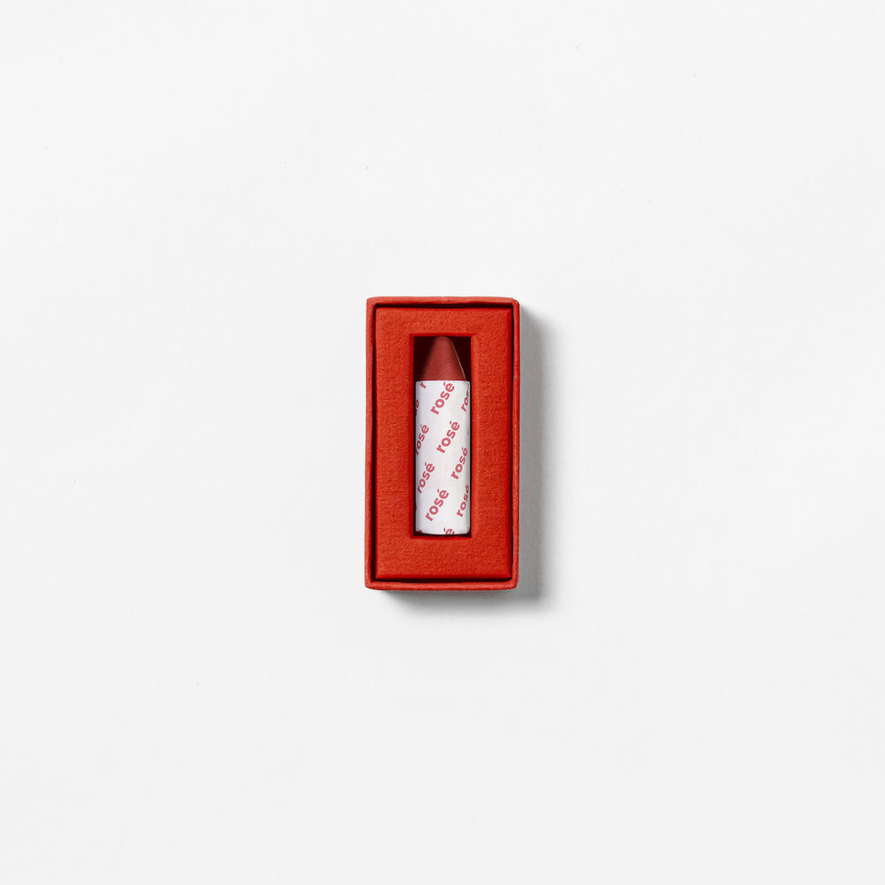 AXIOLOGY Vegan Multi-Use Balmie Crayon Rosé, frosty cream matte makeup for eyes, lips, and cheeks.