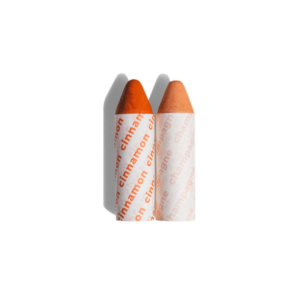 AXIOLOGY Balmie Duo Set Cinnamon + Champagne, matte multi-use crayons for eyes, lips, and cheeks, eco-friendly and vegan.