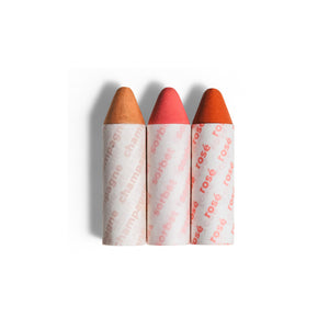 AXIOLOGY Balmie Trio Set in Cotton Candy Skies, including Champagne, Sorbet, and Rosé shades, matte multi-use crayons for eyes, lips, and cheeks, eco-friendly and vegan.