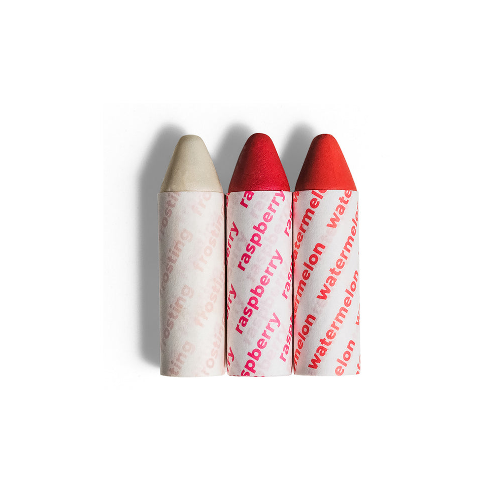 Axiology Balmie Trio Set in Out of Office, featuring Frosting, Raspberry, and Watermelon shades, matte multi-use crayons for eyes, lips, and cheeks, vegan and eco-friendly.