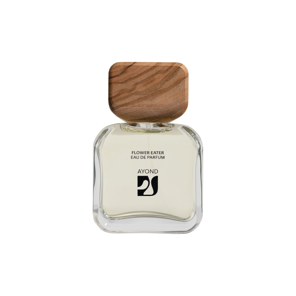 Perfume bottle with wooden cap from Ayond on a white background