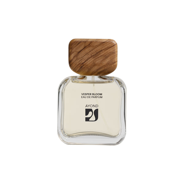 Vesper Bloom perfume bottle by Ayond with wooden cap on a white background