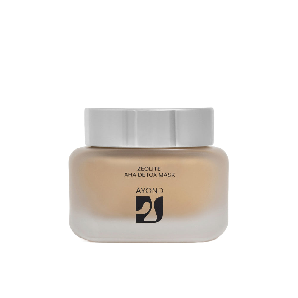 A glass matte clear jar of Ayond Zeolite AHA Detox Mask on a white background