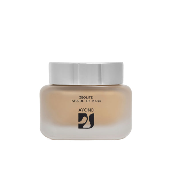 A glass matte clear jar of Ayond Zeolite AHA Detox Mask on a white background