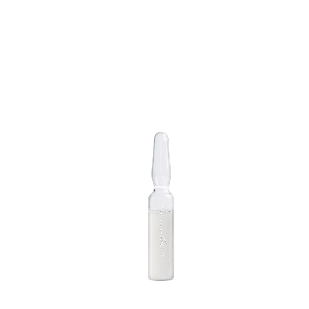 Multiple skincare serum ampoules from Ayuna on a white background