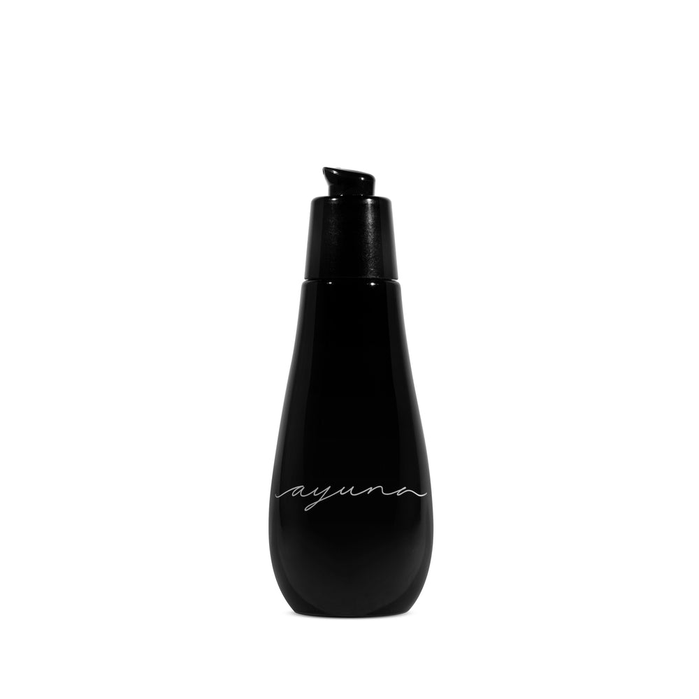 Ayuna Micellar Oil in black glass bottle with black pump on a white background
