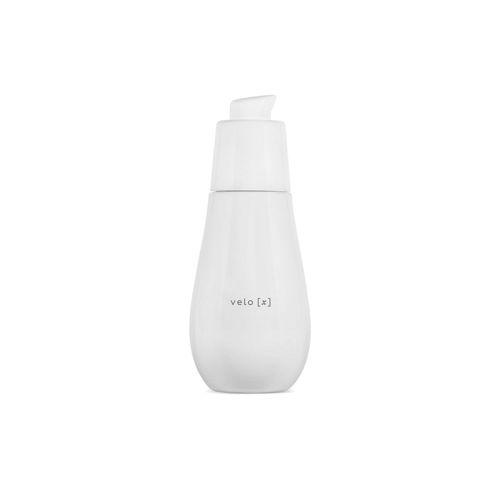 yuna VELO [x] in glass white bottle with white pump on white background