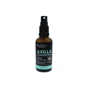 Black Chicken Remedies Axilla Natural Deodorant Spray in an amber glass bottle with black mist sprayer, shown as a natural deodorant spray formulated with botanical waters, essential oils, and zinc in a non aerosol format.
