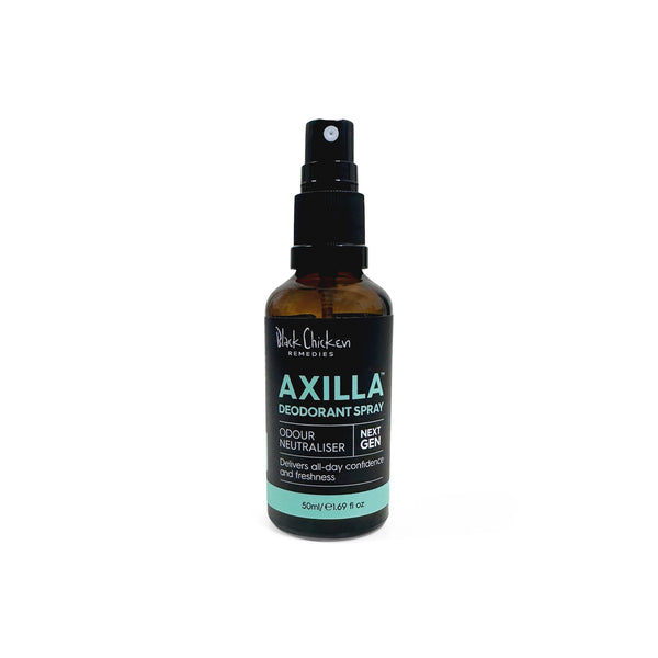 Black Chicken Remedies Axilla Natural Deodorant Spray in an amber glass bottle with black mist sprayer, shown as a natural deodorant spray formulated with botanical waters, essential oils, and zinc in a non aerosol format.