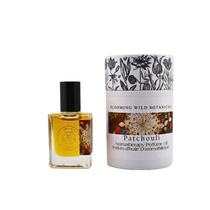 Patchouli perfume bottle and packaging on a white background