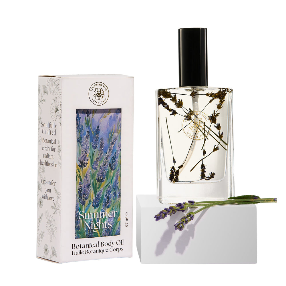 Blooming Wild Summer Nights Lavender Body Oil in a glass bottle, infused with farm-grown lavender for calming, soothing skin care.