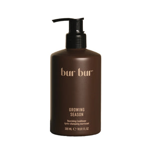 Brown bottle with black pump of BUR BUR Growing Season Nourishing Conditioner on a white background